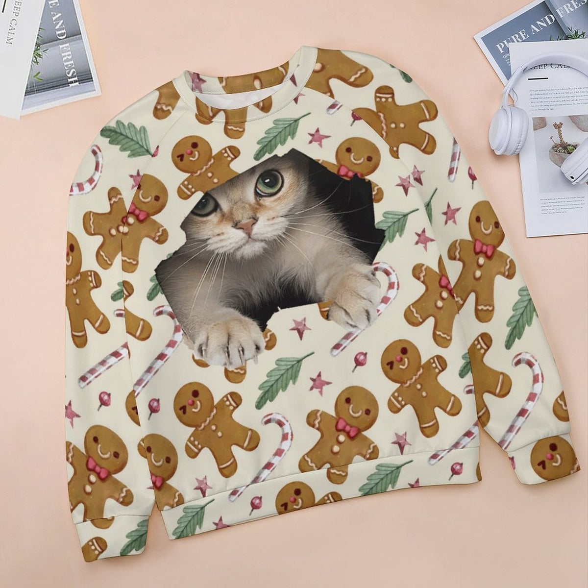 White gingerbread and candy cane cat sweatshirt flat lay
