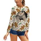 Women's festive cat sweatshirt styled with denim shorts