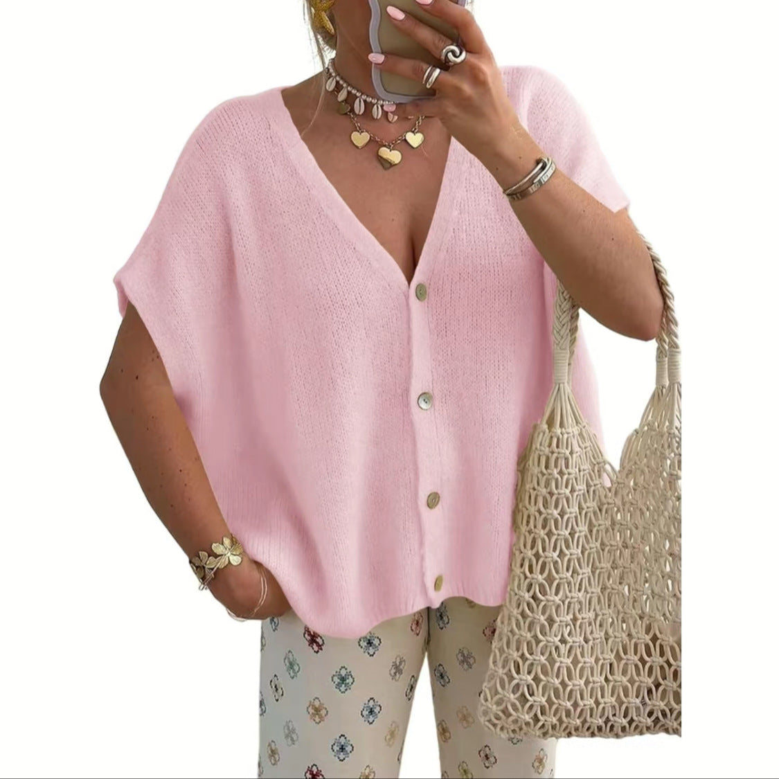 Pink women's relaxed V-neck button front knit cardigan