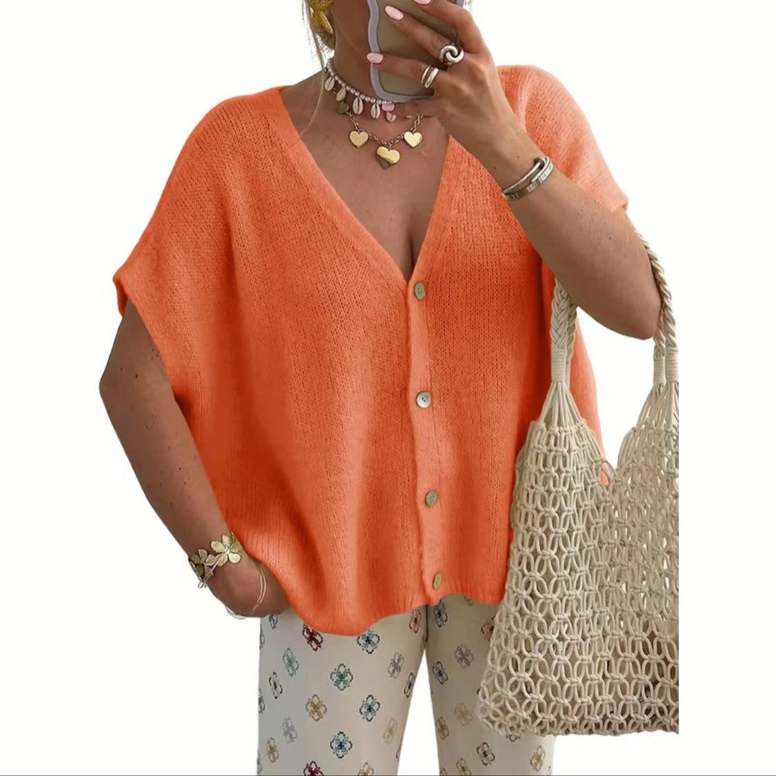 Orange women's relaxed V-neck button front knit cardigan