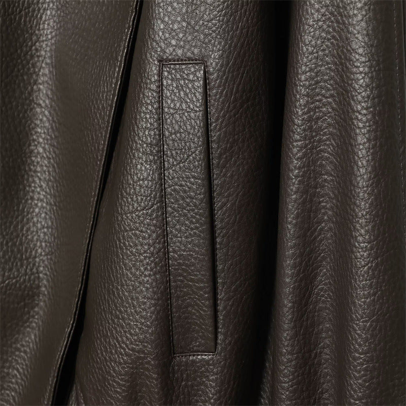 Brown faux leather jacket side welt pocket close-up