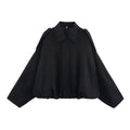 Women's black ultra-loose faux suede bomber jacket, front view