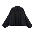Women's black ultra-loose faux suede bomber jacket, front view