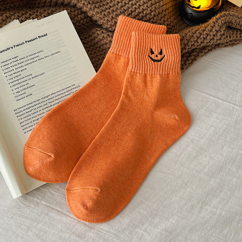 Orange pumpkin embroidered Halloween crew socks