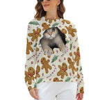Women's gingerbread cat sweatshirt styled with white trousers